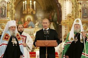 Credit Foto : The Guardian Putin berpidato di dalam gereja Kristen Ortodoks